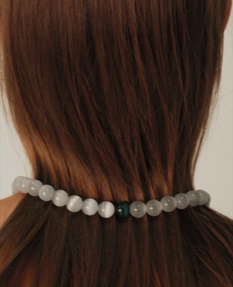 02  ·  Concentrated Energy. Onyx, silver.